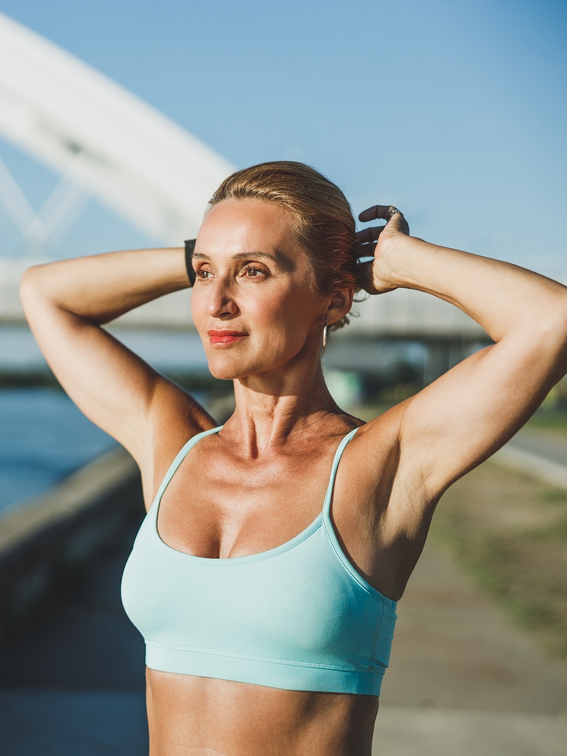 Charlottesville Concierge Medicine model dancing with headphones in a stylish outfit.