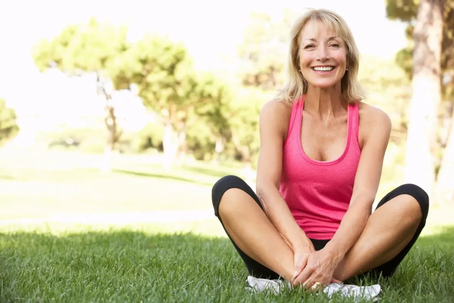 Charlottesville Hormone Replacement Therapy model running outdoors with a joyful expression.